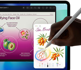 iPad Pro, front exterior display with dark blue and green gradient background with multiple apps open, hand holding Apple Pencil Pro circling a sketch showing Apple Intelligence Image Wand feature