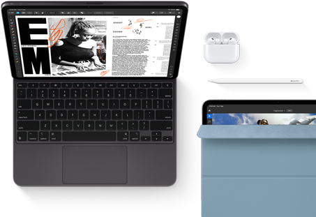iPad Pro attached to Magic Keyboard, front exterior, space black color, rounded corners, black display bezel, open, display showing article editing app with text and photograph of a woman playing music, Airpods 4 in open case, blue Smart Folio cover on iPad Pro with Apple Pencil Pro resting atop device, cover slightly open revealing display